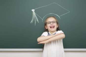 smiling girl with grad cap